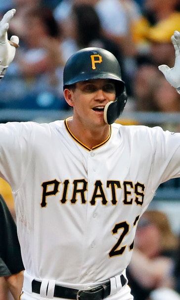 Bell caps historic month in style, Pirates top Brewers 9-4